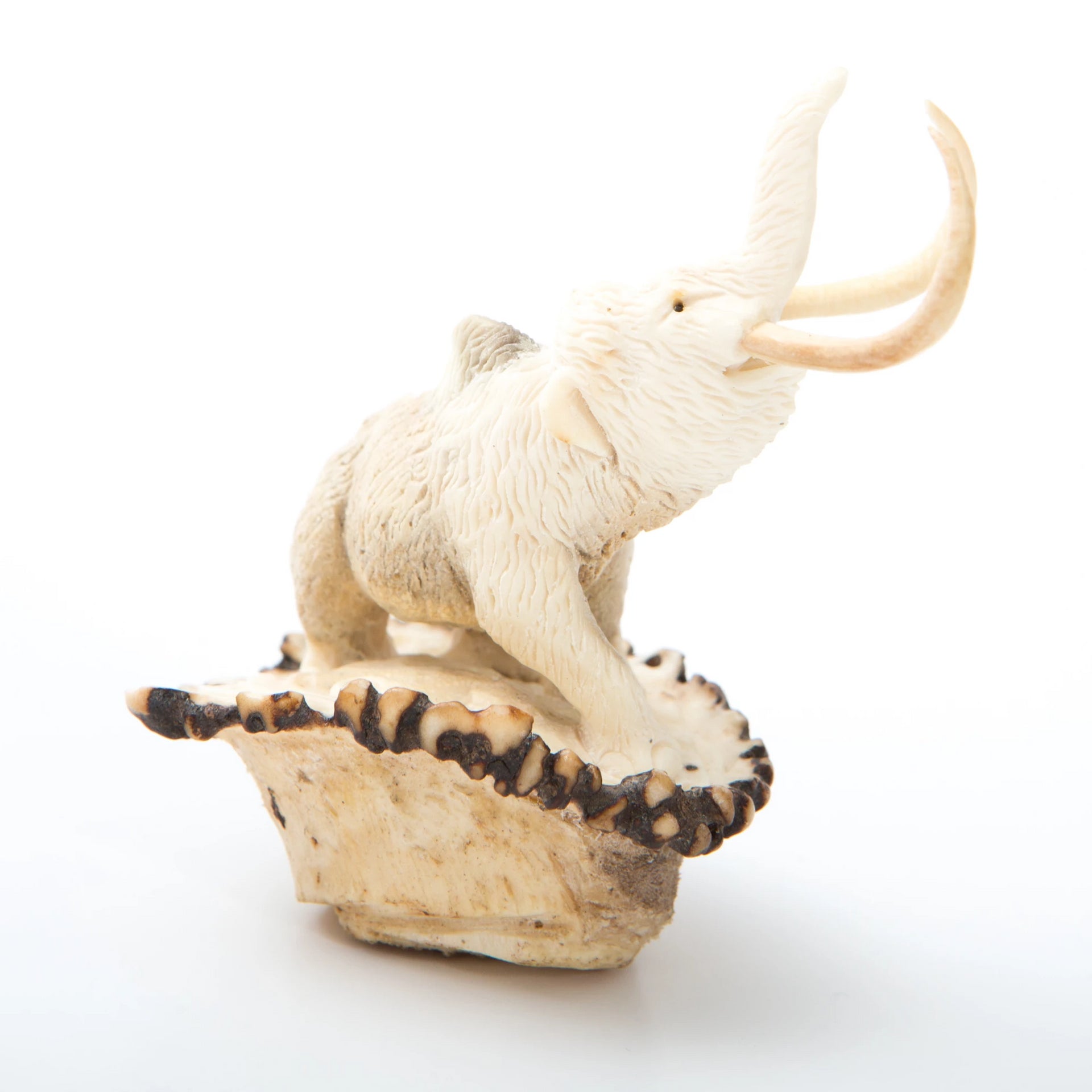 Carved mammoth with base