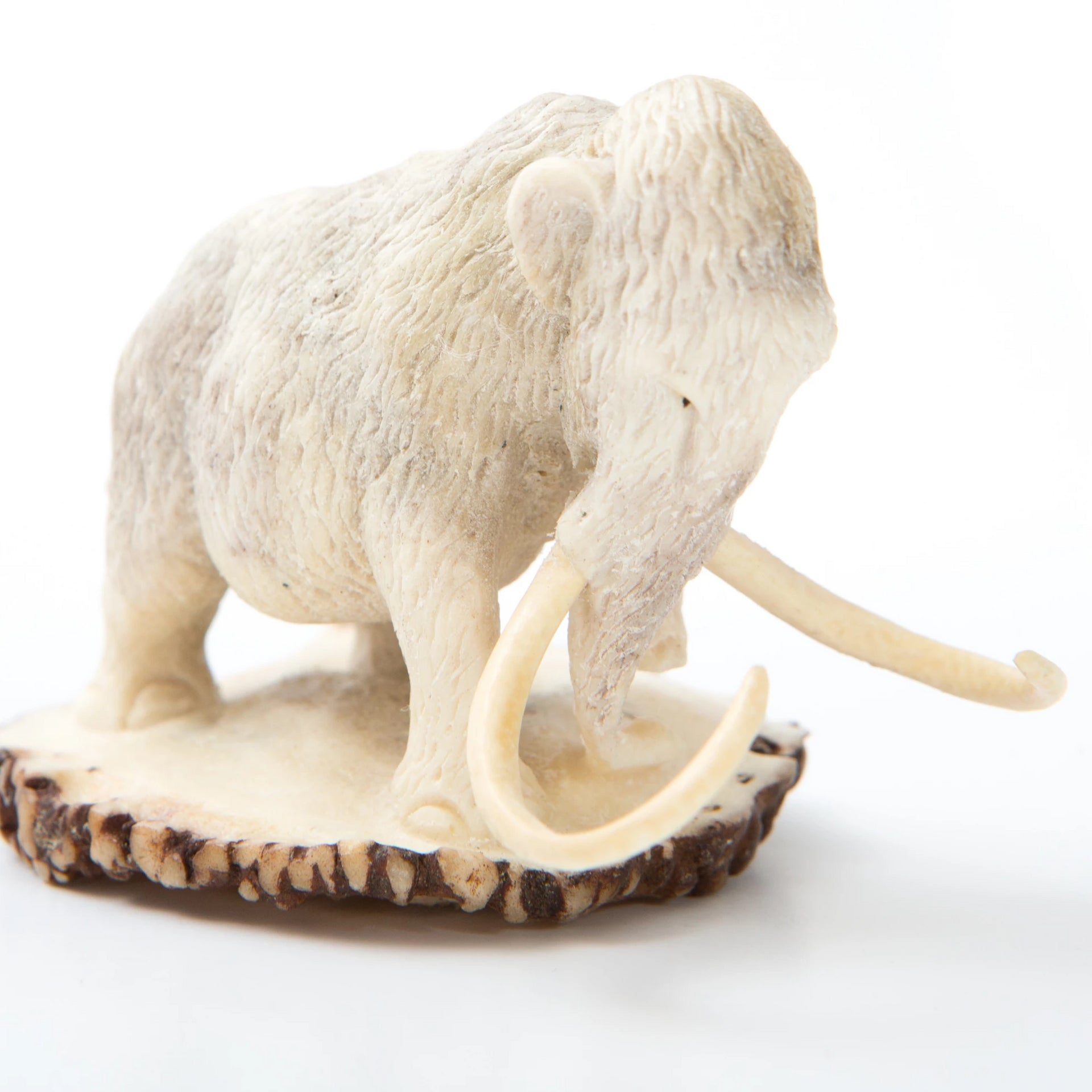 Carved mammoth with base